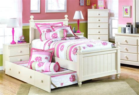 It provides two sleeping spaces in one piece of furniture (much like bunk beds), but takes up no more space than a regular twin sized bed during the. Girls Room, Trundle Bed | Girls bedroom sets, Girls ...