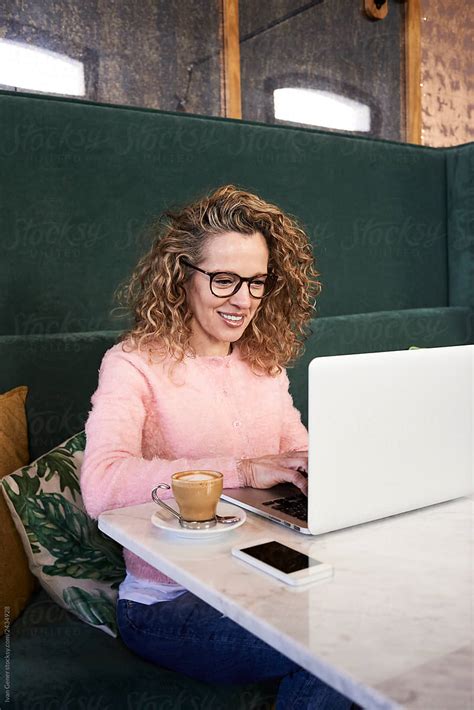 Middle Aged Entrepreneur Woman With Laptop By Stocksy Contributor
