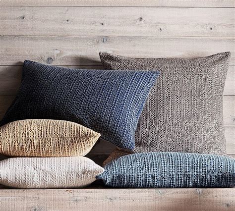 Pair of pottery barn euro pillows.cream, with blues, rust, tan, brown crewel embroidery.100% cotton23 squareoverlap closure in back.poly fill pillow inserts. Honeycomb Lumbar Pillow Covers | Pottery Barn CA
