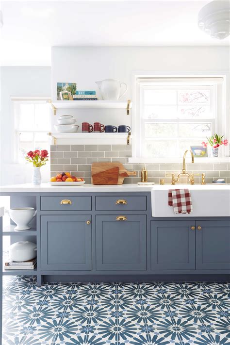 It's the perfect pop of color for this misty gray kitchen. Emily Henderson blue grey kitchen with concrete tiles in ...