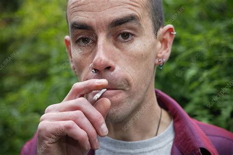 Portrait Of A Man Smoking Stock Image C0464746 Science Photo Library