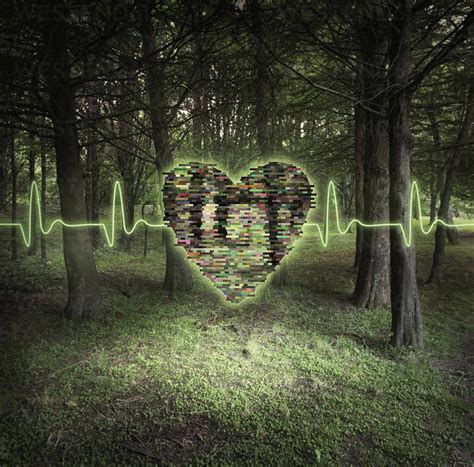 Pixelated Heart Floating In Forest Stock Photo