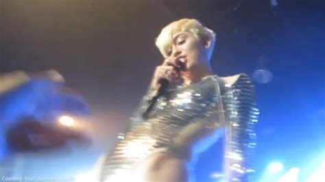 Concert Goers Touch Miley In Hi Cut Leotard News Com Au Australias