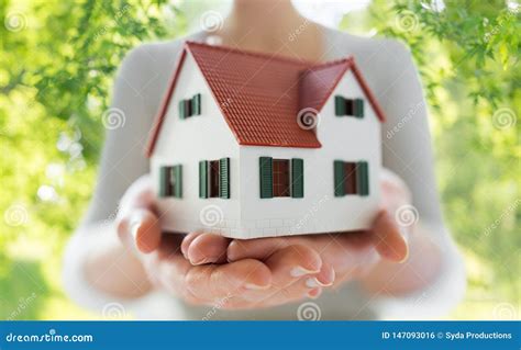 Close Up Of Hands Holding House Or Home Model Stock Photo Image Of
