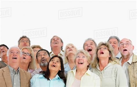A Group Of People Looking Up Stock Photo Dissolve