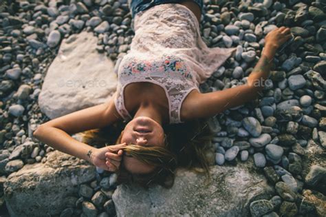 Dreamy Girl Laying On Beach Stock Photo By Avanti Photo Photodune