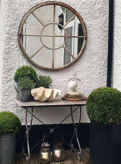 Beautiful Detail Display With This Architectural Circular Window Mirror