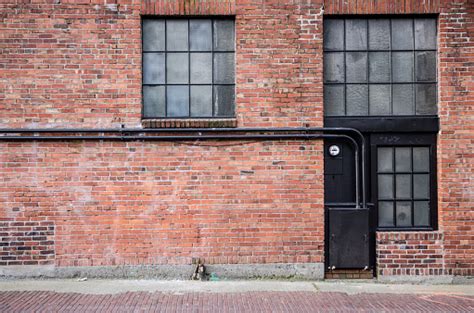 Old Brick Alleyway With Windows Stock Photo Download Image Now