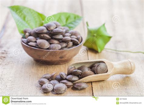 Dried Capsule Seeds Fruit Of Sacha Inchi Peanut On Wooden Stock Photo
