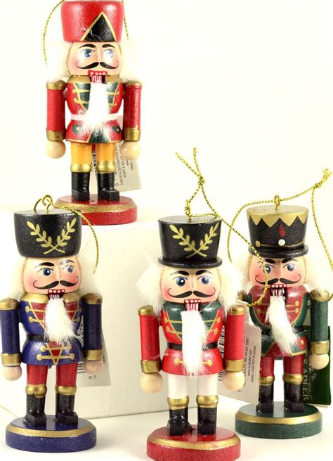 Group Of 4 Nutcrackers In Various Colors 4 Wooden Christmas Ornaments