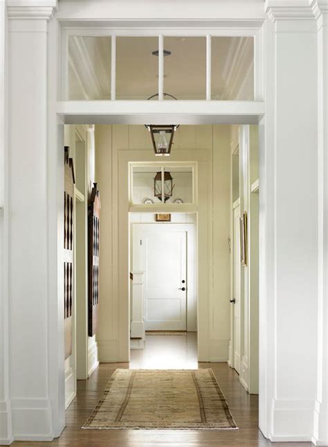 A Long Narrow Hallway Help For A Dark Scary Mess Transom Windows Narrow Hallway Doors Interior