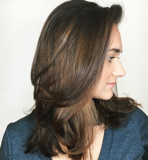 I think it's honestly so long and thick that the weight is pulling it straighter as well, so hoping just losing bulk may enhance the wave pattern. 50 Best Medium Length Haircuts for Thick Hair to Try in ...