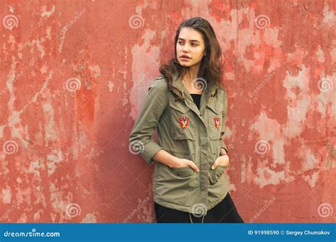 Youth Pretty Female On Street Near Red Wall Stock Photo Image Of