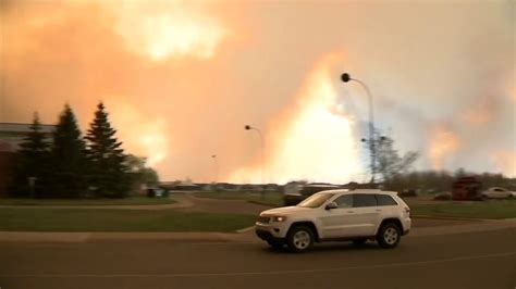 Residents Evacuate As Wildfire Rages In Fort Mcmurray Youtube