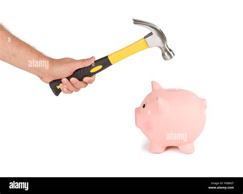 Breaking A Piggy Bank Stock Photo Alamy