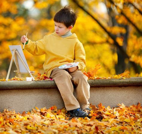 Cute Little Boy Painting In Golden Autumn Park Stock Image Image Of