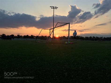 30 action packed photos of people playing football soccer at sunset 500px