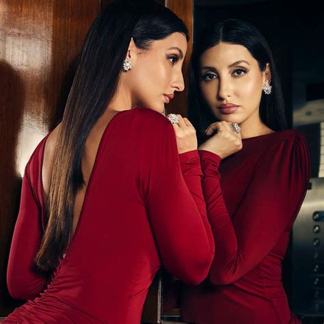 it s a red velvet like night for nora fatehi as she sparks hotness in backless bodycon dress