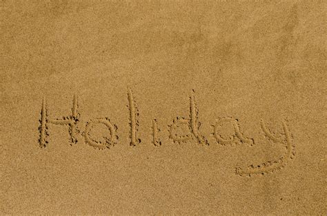Holiday Written In The Sand Free Stock Photo Public Domain Pictures