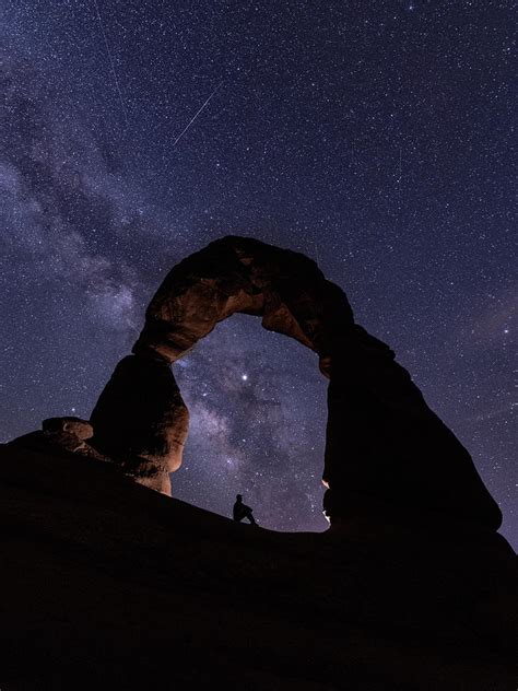 Sitting Under Delicate Arch At Night Photograph By Ben Ford Pixels
