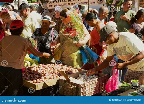 People Do Shopping At The Market In Saint Denis De La Reunion France
