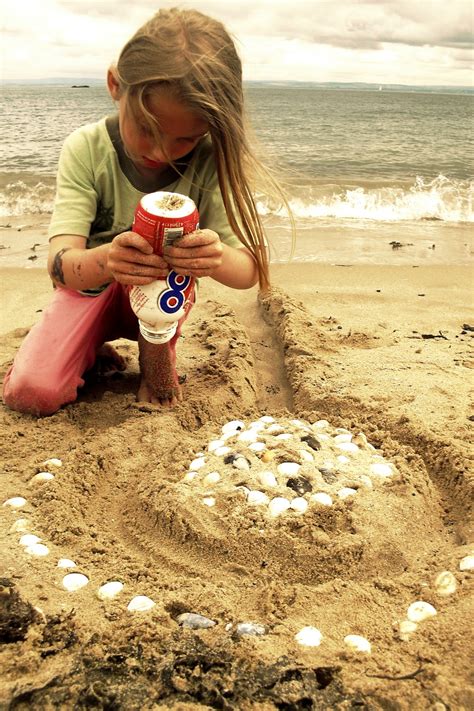 Give your kid a beach bucket and a plastic shovel to dig a horizontal pit in the sand. Free Images : beach, sea, water, sand, rock, play, summer ...