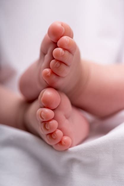 Premium Photo Newborn Baby Feet On A White Blanket Feet Of Baby Boy