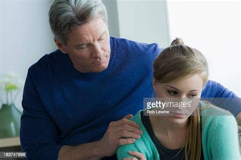 Dad Comforting Teenage Daughter Photos And Premium High Res Pictures