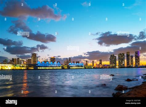 Miami Florida Cityscape Skyline On Biscayne Bay Panorama At Dusk With