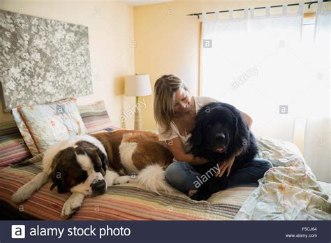 Sleeping Woman Dog In Bedroom Hi Res Stock Photography And Images Alamy