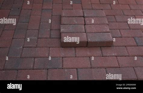 4k Stacking Pavers Appear One By One Stock Video Footage Alamy