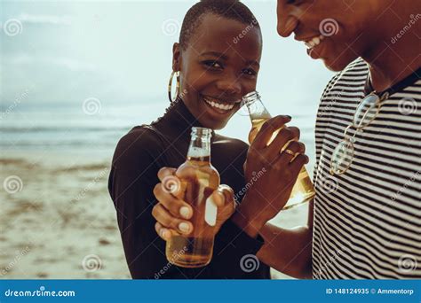 Couple In Love Drinking Beer At Beach Stock Image Image Of Holding