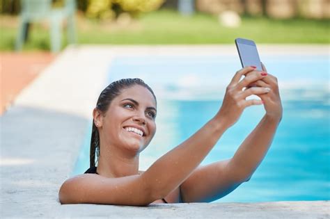 Premium Photo Woman Take A Selfie At Swimming Pool