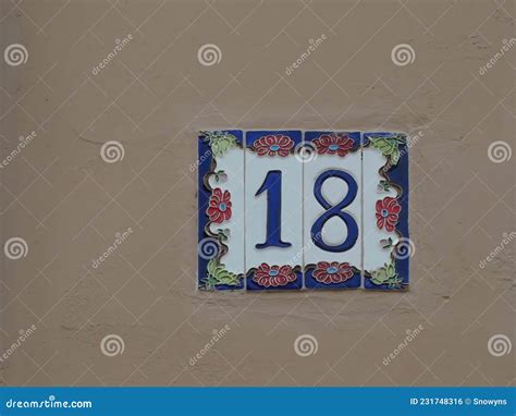 House Number 18 On The Tiles On The Orange Wall Stock Photo Image Of