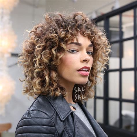 shaggy curly fro with bangs and brunette ombre color the latest hairstyles for men and women