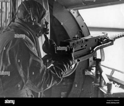 B 17 Waist Gunner In 1943 Stock Photo Alamy