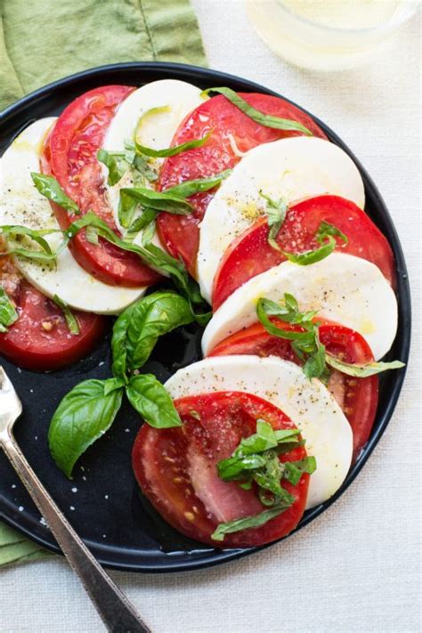 Tomato mozzarella salad is a summer favorite for those who want lo lose weight, learn more about more options to obtain better results. Tomato and Mozzarella Caprese Salad 101 — The Mom 100