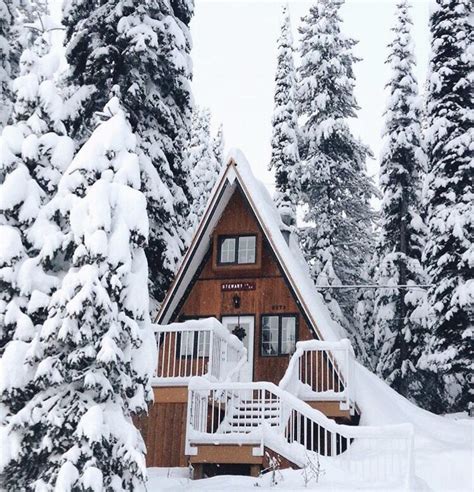 A Cozy Little Cabin In The Snowy Woods Outdoors