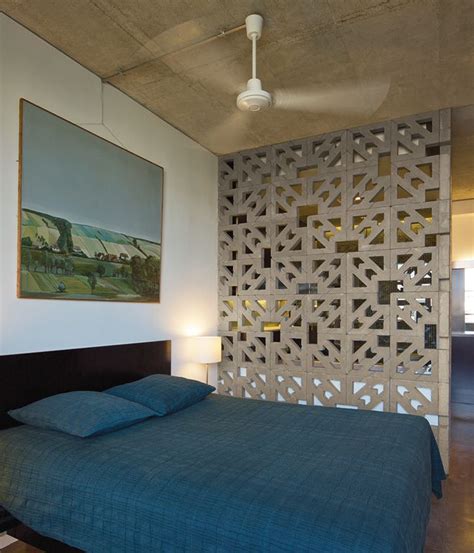 But while cinder block walls may seem intimidating to fix, making reparations is simple if you have the right tools. open-cell concrete blocks as an interior functional ornament | Concrete block walls, Cinder ...