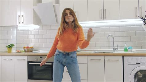 Young Happy Woman Dancing In Kitchen And Having Some Fun Stock Video