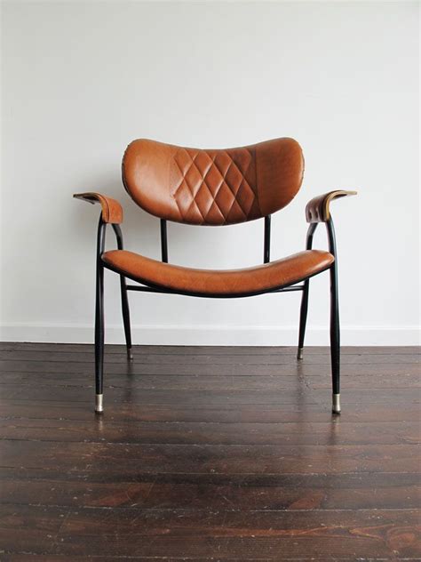 Leather vintage and retro armchairs. Wonderful vintage Italian steel and leather armchair ...