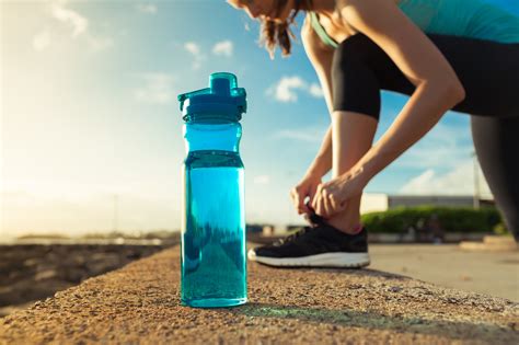 How Should You Drink Water While Running