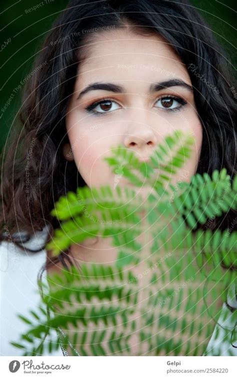 Attractive Brunette Girl Enjoying A Day In The Countryside A Royalty