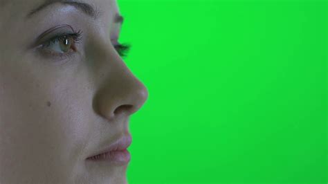 Close Up Of Young Caucasian Women Face Outcropped Against Green Screen Stock Video Footage 0011