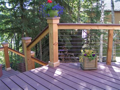 Posts, upper, and lower wooden rail. Awesome Cable Deck Railing Ideas #13 Wire Deck Railing Ideas | Newsonair.org
