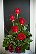 A stunning and unique Valentine's Day arrangement created with red ...