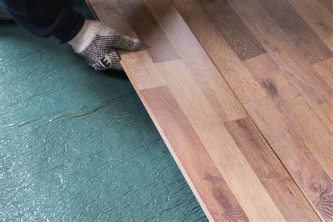 We laid the first row by the door, to get the painful experience of cutting around door jambs ov. How does laminate flooring click together?