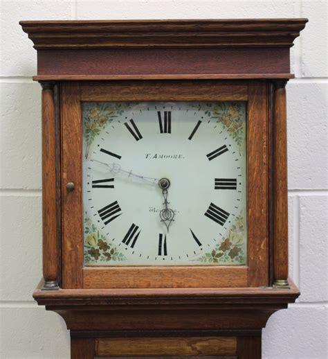 A 19th Century Oak Longcase Clock With Thirty Hour Movement Striking On A Bell Via An Outside Countw