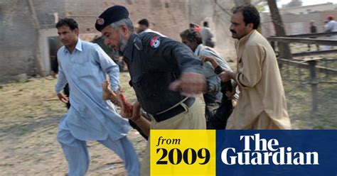 Pakistan Suicide Bombers Hit Police Station Pakistan The Guardian