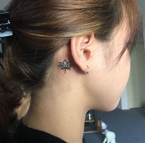 Simple Lotus Flower Tattoo Behind Ear